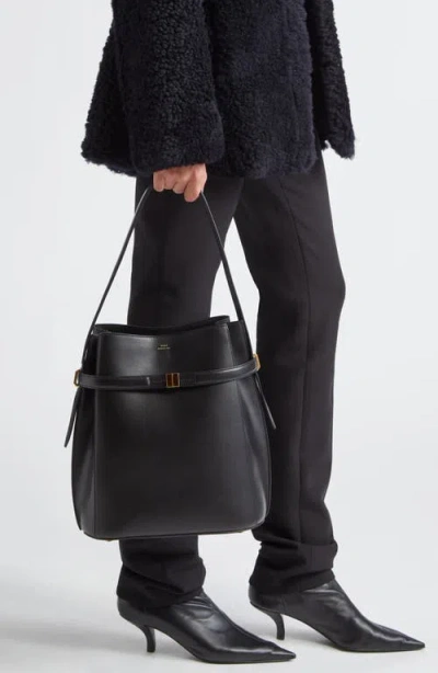 Totême Belted Palmellata Leather Bucket Bag In Black