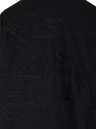 Burberry Logo Embossed Drawstring Jacket In Black