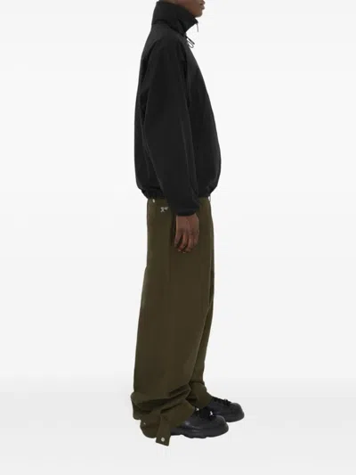 Burberry Logo Embossed Drawstring Jacket In Black