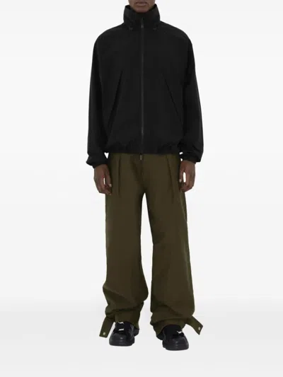 Burberry Logo Embossed Drawstring Jacket In Black