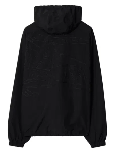 Burberry Logo Embossed Drawstring Jacket In Black