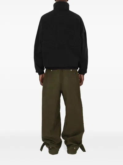 Burberry Logo Embossed Drawstring Jacket In Black