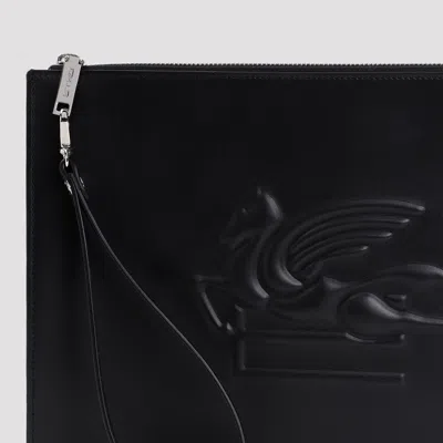 Shop Etro Logo Embossed Pouch In Nero