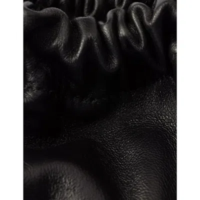 Prada Mini Logo Plaque Leather Bucket Bag In Black