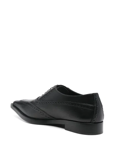 Alexander Mcqueen Pointed-toe Brogues In Black