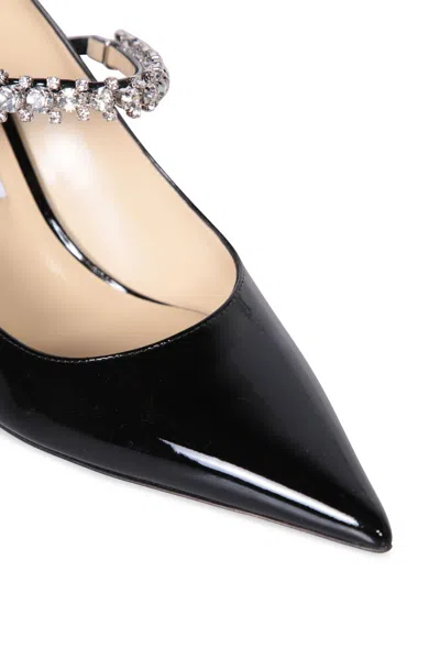 Shop Jimmy Choo Embellished Pointed-toe Pumps In Black