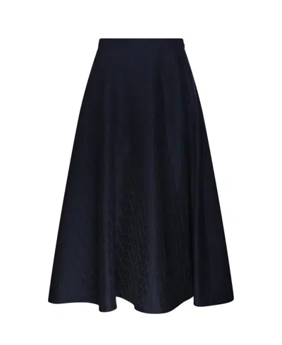 Shop Valentino All-over Logo Patterned Pleated Skirt In Blue