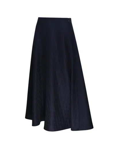 Shop Valentino All-over Logo Patterned Pleated Skirt In Blue