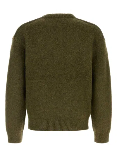 Burberry Wool And Cashmere Sweater With Logo Pendant In Grün