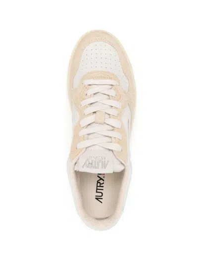 Shop Autry Sneakers In Beige