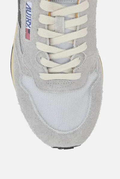 Shop Autry Sneakers In Silver