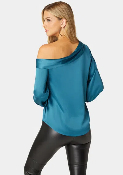 Bebe Asymmetrical Long Sleeve Slit Detail Satin Blouse In Deep Lagoon