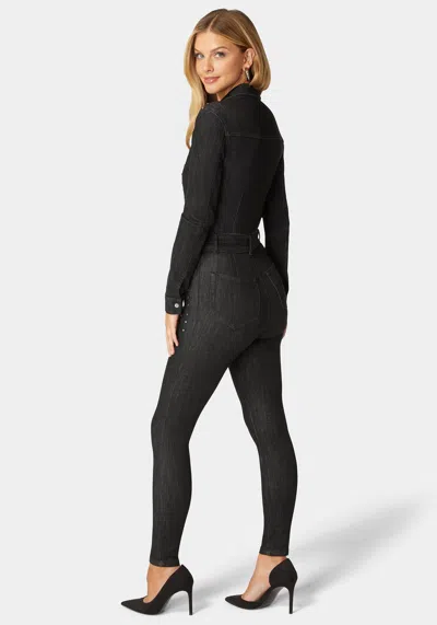 Bebe Skinny Studded Zip Up Front Denim Jumpsuit In Washed Out Black