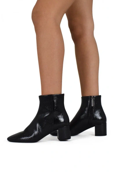 Saint Laurent Pointed-toe Panelled Boots In Black