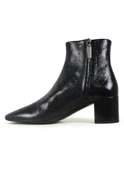 Saint Laurent Pointed-toe Panelled Boots In Black