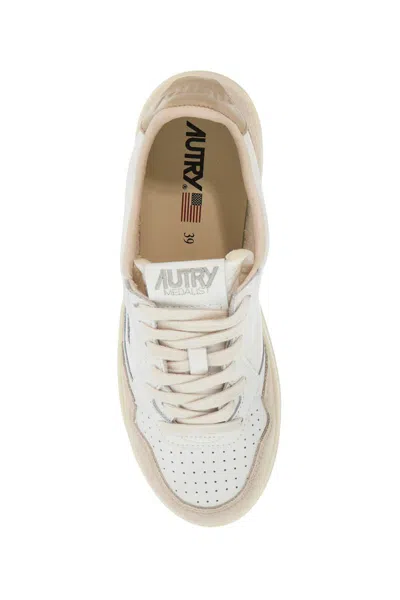 Shop Autry Leather Medalist Low Sneakers In Beige