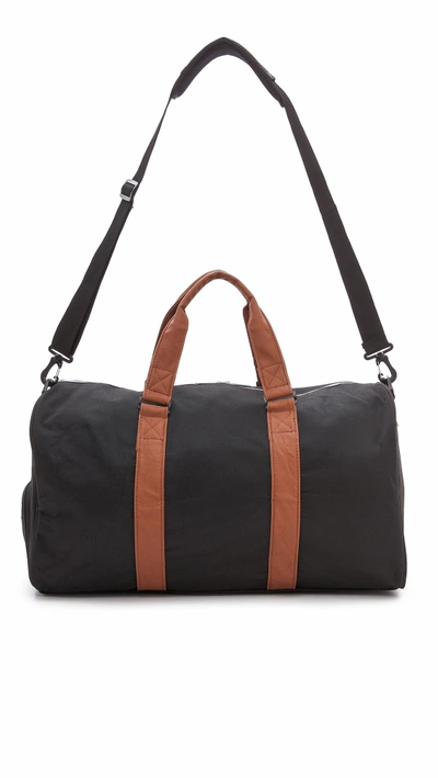 Shop Herschel Supply Co. Novel Duffel Bag In Black