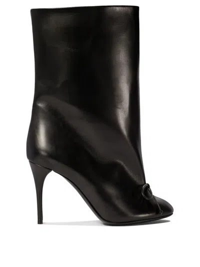 Alaïa Low Black Leather Boots In Black