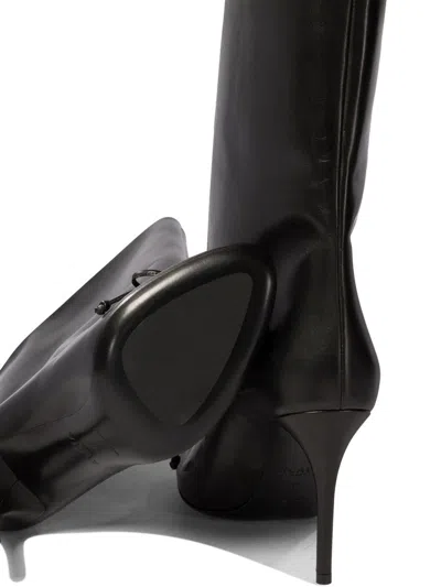 Alaïa Low Black Leather Boots In Black