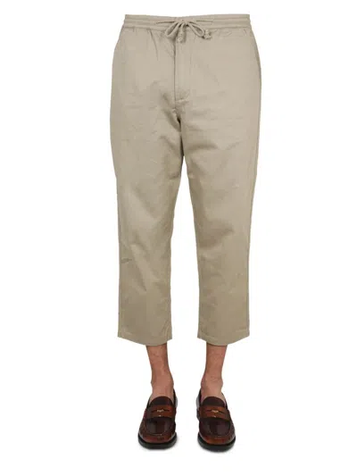 Shop Universal Works Cropped Fit Pants In Beige