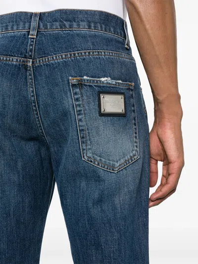 Shop Dolce & Gabbana Straight Jeans With A Worn Effect