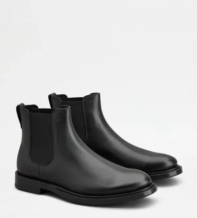 Shop Tod's Boots In Black