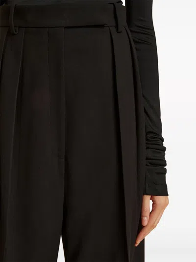 Khaite Cessie Pleated High-waisted Trousers