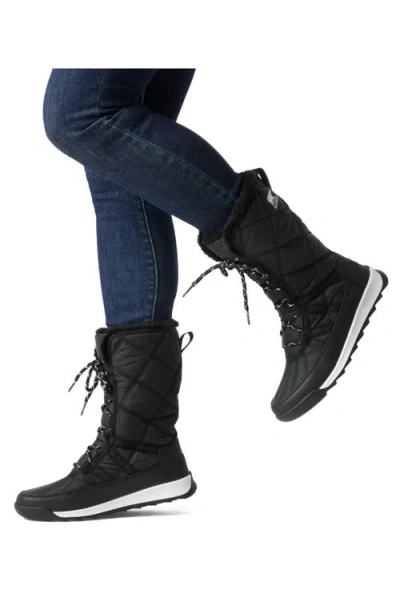 Shop Sorel Whitney Ii Waterproof Snow Boot In Black/sea Salt