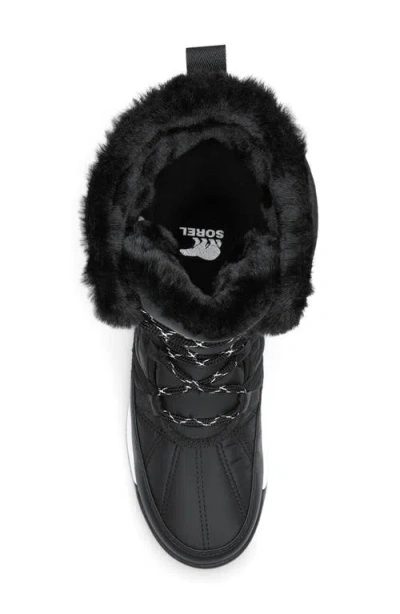 Shop Sorel Whitney Ii Waterproof Snow Boot In Black/sea Salt