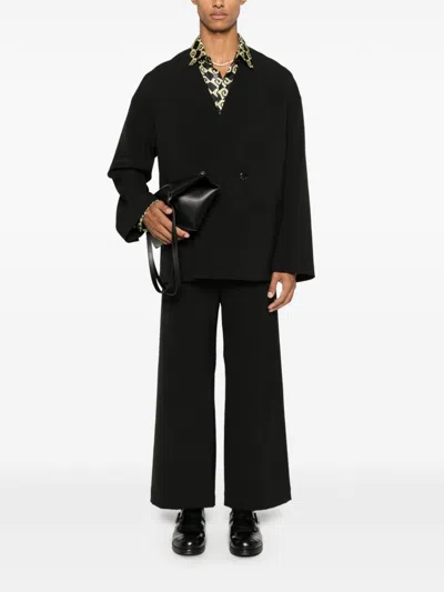Nanushka Arnaud Trousers In Black