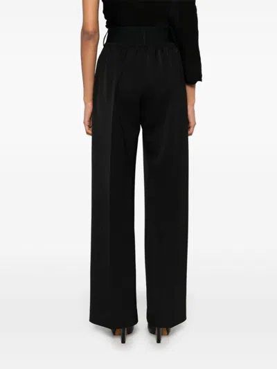 Alainpaul Logo-jacquard Trousers In Black
