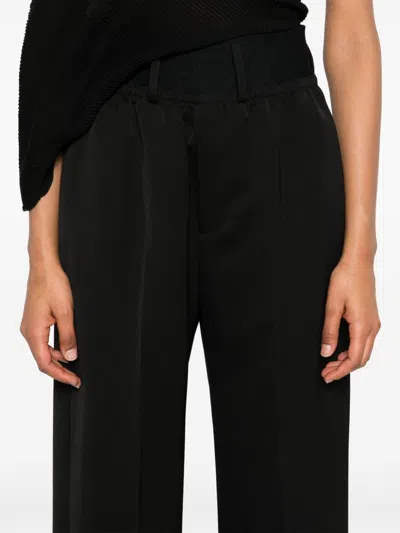 Alainpaul Logo-jacquard Trousers In Black