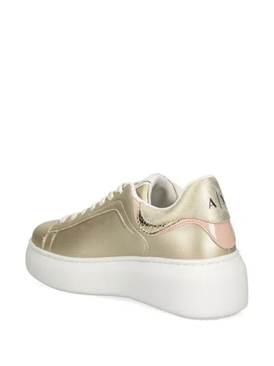 Shop Armani Exchange Gold-tone Trainers