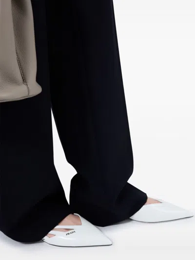 Prada Pointed Toe Cut-out Ballerina Shoes In White