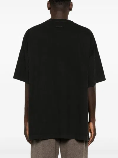 Shop Fear Of God T-shirt In Black