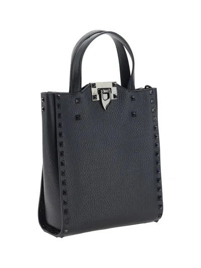 Shop Valentino Rockstud Small Handbag In Nero