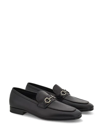 Shop Ferragamo Gancini-plaque Loafers In Black