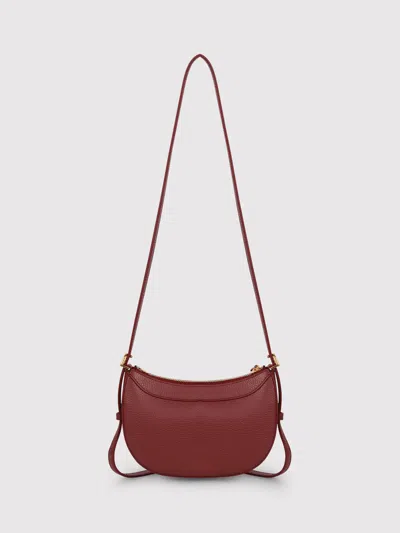 Shop Coccinelle Whisper Shoulder Bag In Red