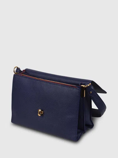 Shop Coccinelle Binxie Shoulder Bag In Blue