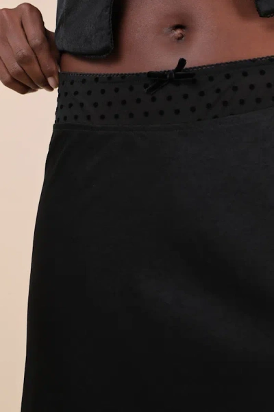 Nia Mira Black Satin Mesh Polka Dot Midi Skirt In Black