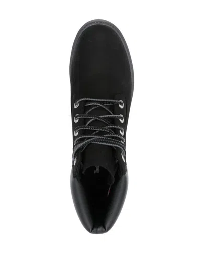 Shop Timberland Boots In Black