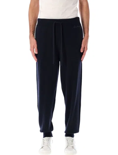 Shop Burberry Logo Embroidered Knitted Jogging Pants In Navy