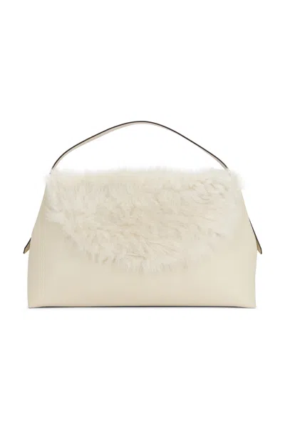 Totême Shearling T-lock Top Handle Bag In Ecru