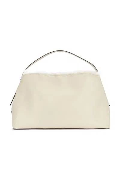 Totême Shearling T-lock Top Handle Bag In Ecru