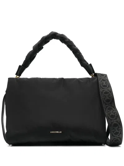 Shop Coccinelle Padded Crossbody Bag In Black