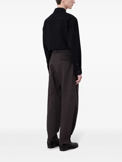 Shop Lemaire Twisted Tapered Trousers In Brown