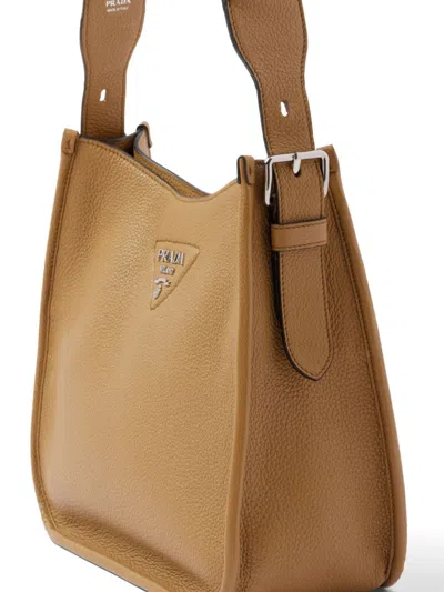 Shop Prada Leather Hobo Bag In Braun