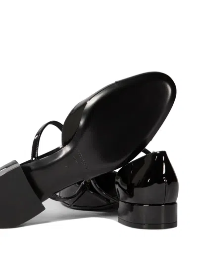 Ferragamo Elegant Patent Leather Ballet Flats With Golden Accents In Black