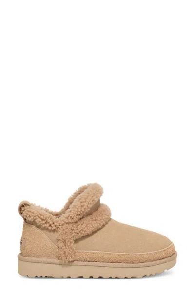 Ugg(r) Classic Ultra Mini Spillseam Genuine Shearling Bootie In Sand
