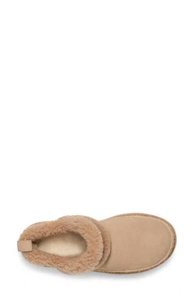 Shop Ugg(r) Classic Ultra Mini Spillseam Genuine Shearling Bootie In Sand
